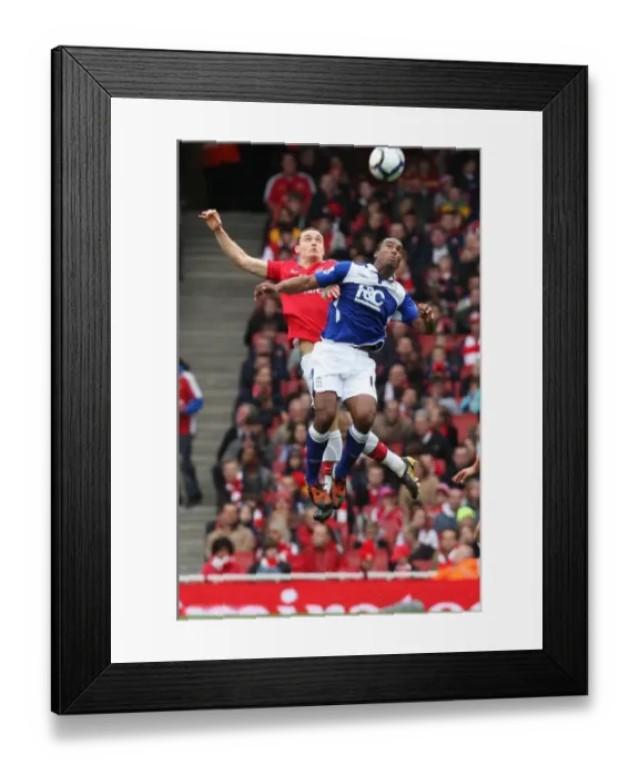 Framed Print : Thomas Vermaelen (Arsenal) Cameron Jerome (Birmingham) Framed Print : Thomas Vermaelen (Arsenal) Cameron Jerome (Birmingham)