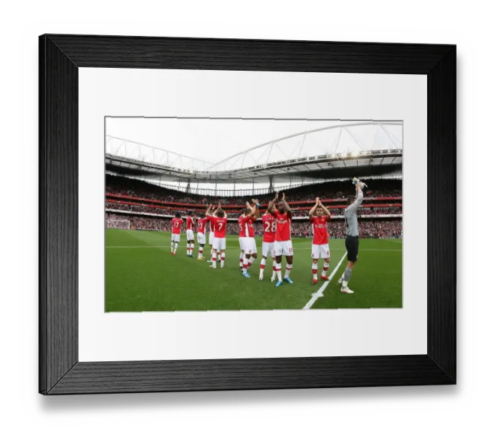 Framed Print : The Arsenal team clap the fans before the match