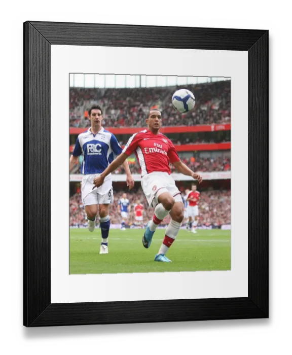 Framed Print : Theo Walcott's Brace: Arsenal's 3-1 Triumph over Birmingham City Framed Print : Theo Walcott's Brace: Arsenal's 3-1 Triumph over Birmingham City