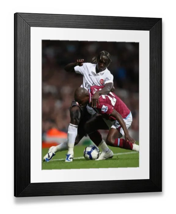 Framed Print : Bacary Sagna (Arsenal) Henrita Ilunga (West Ham) Framed Print : Bacary Sagna (Arsenal) Henrita Ilunga (West Ham)