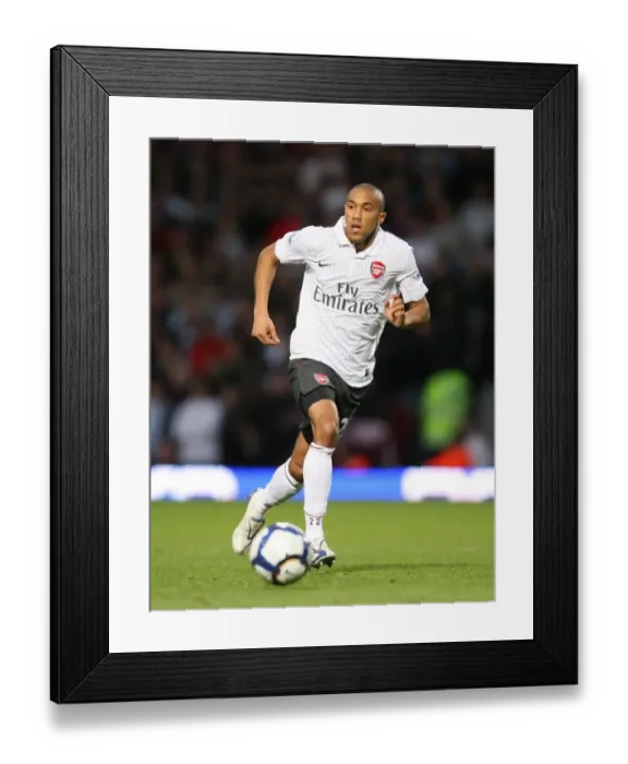 Framed Print : Intense Battle: Clichy vs. West Ham United - Arsenal's Defender in Action Framed Print : Intense Battle: Clichy vs. West Ham United - Arsenal's Defender in Action