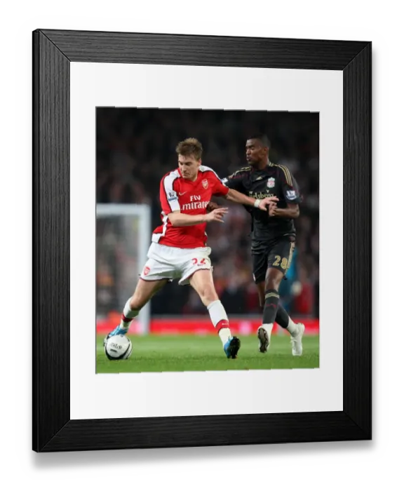 Framed Print : Nicklas Bendtner (Arsenal) Damien Plessis (Liverpool) Framed Print : Nicklas Bendtner (Arsenal) Damien Plessis (Liverpool)