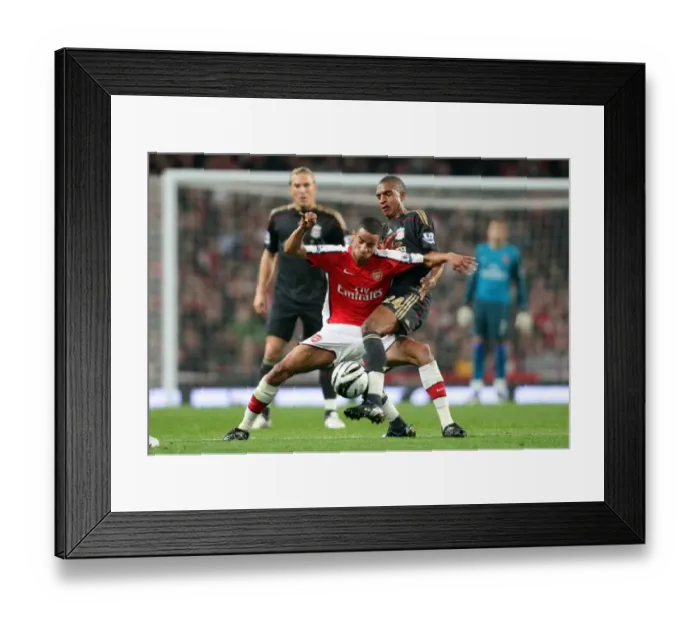 Framed Print : Arsenal's Craig Eastmond vs. Liverpool's David Ngog: A Clash in the Carling Cup, Arsenal 2:1 Framed Print : Arsenal's Craig Eastmond vs. Liverpool's David Ngog: A Clash in the Carling Cup, Arsenal 2:1