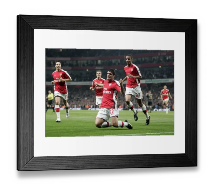Framed Print : Fran Merida's Thriller: Arsenal's First Goal in Exciting 2-1 Victory over Liverpool