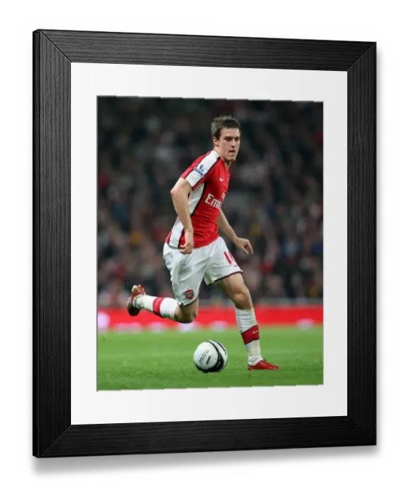 Framed Print : Arsenal's Aaron Ramsey Scores the Winner Against Liverpool in Carling Cup