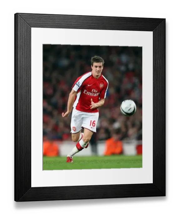 Framed Print : Arsenal's Aaron Ramsey Scores Game-Winning Goal Against Liverpool in Carling Cup 4th Round Framed Print : Arsenal's Aaron Ramsey Scores Game-Winning Goal Against Liverpool in Carling Cup 4th Round