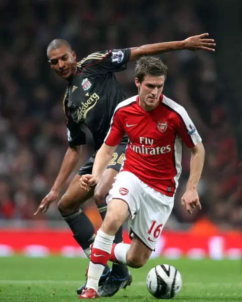 Aaron Ramsey (Arsenal) David Ngog (Liverpool)