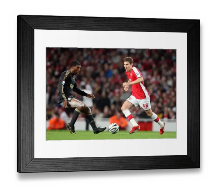 Framed Print : Mark Randall (Arsenal) Ryan Babel (Liverpool)