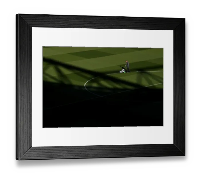 Framed Print : Arsenal's Groundsman Prepares the Pitch for Arsenal v Leicester City (2018-19) Framed Print : Arsenal's Groundsman Prepares the Pitch for Arsenal v Leicester City (2018-19)
