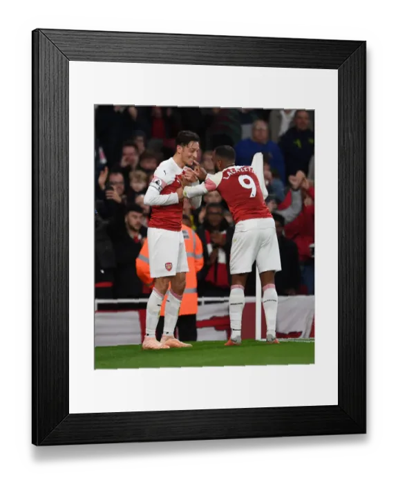 Framed Print : Arsenal's Star Duo: Ozil and Lacazette Celebrate First Goal vs Leicester City (2018-19)