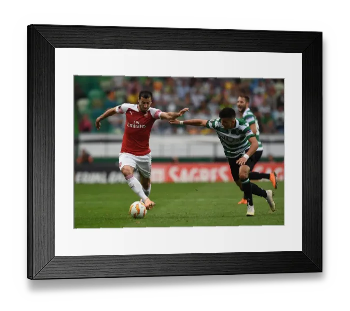 Framed Print : Mkhitaryan vs Acuna: A Europa League Battle at the Estadio Jose Alvalade Framed Print : Mkhitaryan vs Acuna: A Europa League Battle at the Estadio Jose Alvalade