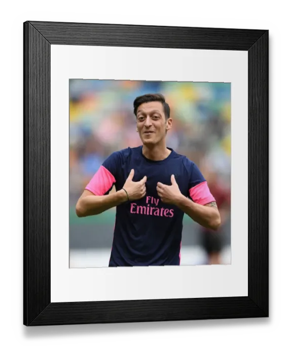 Framed Print : Mesut Ozil: Arsenal's Star Guns for Europa League Victory against Sporting Lisbon Framed Print : Mesut Ozil: Arsenal's Star Guns for Europa League Victory against Sporting Lisbon
