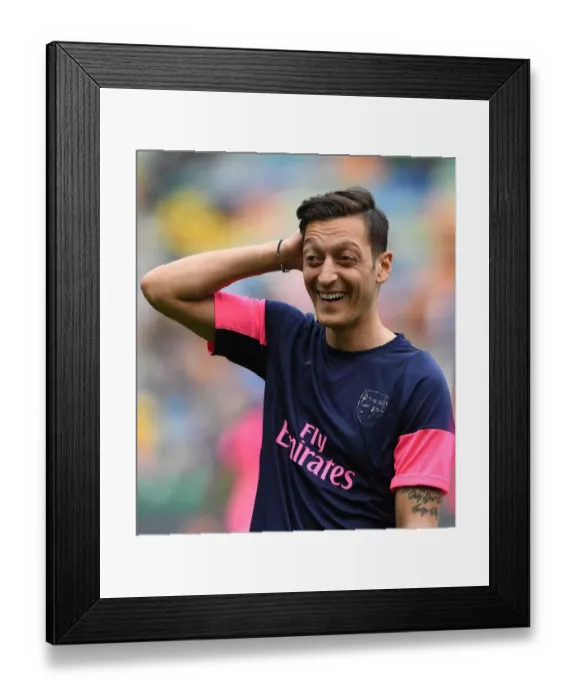 Framed Print : Mesut Ozil: Arsenal's Star Player Prepares for Europa League Showdown against Sporting Lisbon Framed Print : Mesut Ozil: Arsenal's Star Player Prepares for Europa League Showdown against Sporting Lisbon