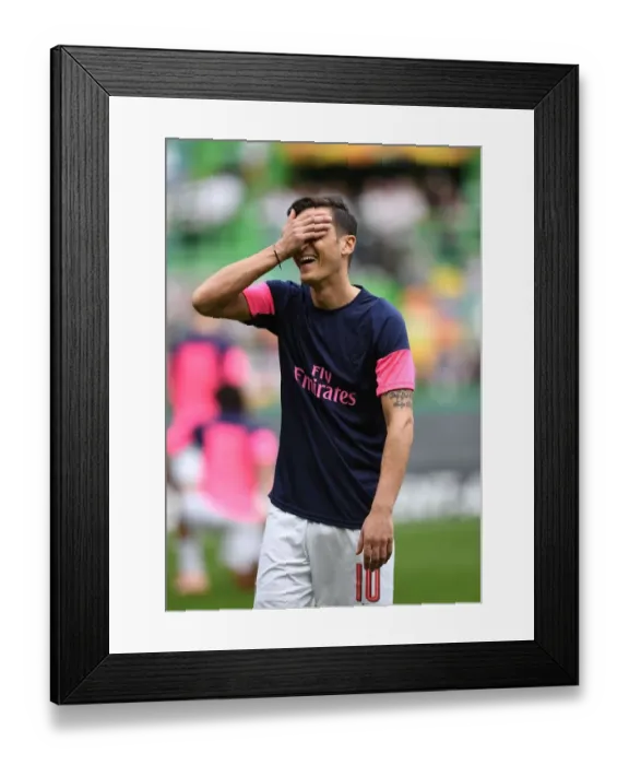 Framed Print : Mesut Ozil: Arsenal's Star Ready for Europa League Battle Against Sporting Lisbon Framed Print : Mesut Ozil: Arsenal's Star Ready for Europa League Battle Against Sporting Lisbon