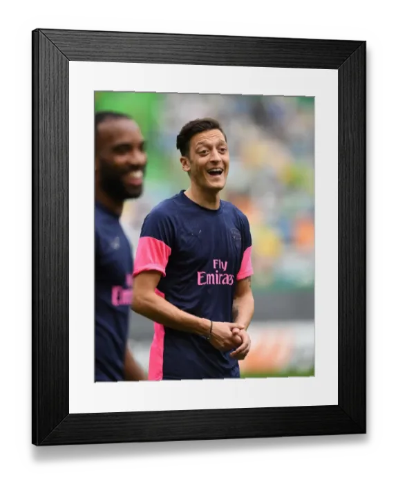 Framed Print : Mesut Ozil: Arsenal's Star Prepares for Europa League Showdown against Sporting Lisbon Framed Print : Mesut Ozil: Arsenal's Star Prepares for Europa League Showdown against Sporting Lisbon