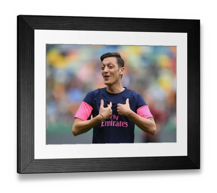 Framed Print : Mesut Ozil Prepares for Arsenal's Europa League Clash Against Sporting Lisbon