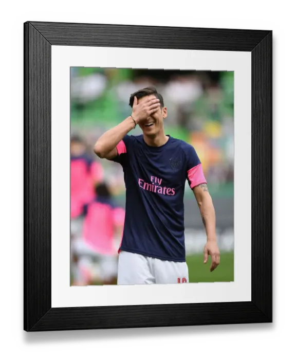 Framed Print : Mesut Ozil: Arsenal's Star Prepares for Europa League Showdown against Sporting Lisbon