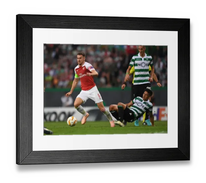 Framed Print : Clash of Stars: Ramsey vs. Montero in Europa League Showdown Framed Print : Clash of Stars: Ramsey vs. Montero in Europa League Showdown