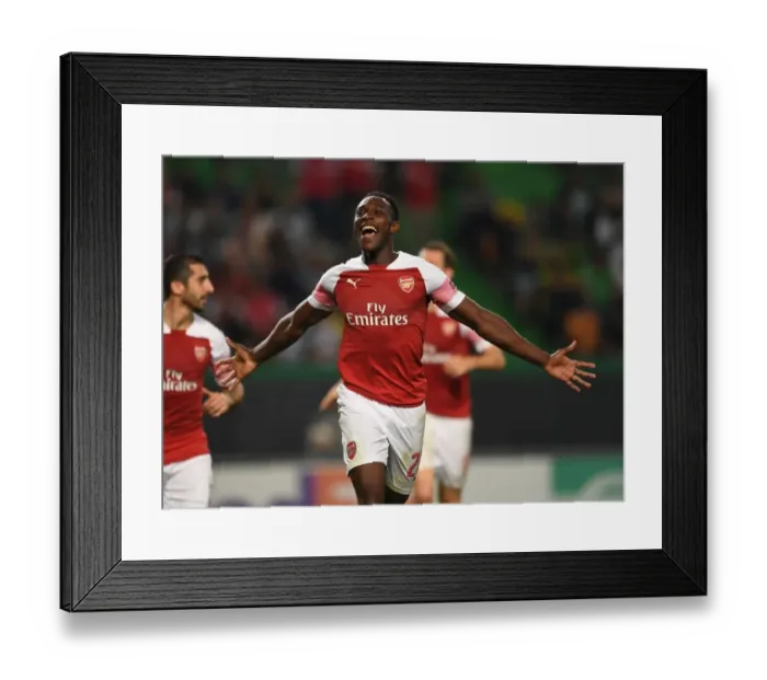 Framed Print : Danny Welbeck's Game-Winning Goal: Arsenal Secures Europa League Triumph over Sporting Lisbon Framed Print : Danny Welbeck's Game-Winning Goal: Arsenal Secures Europa League Triumph over Sporting Lisbon