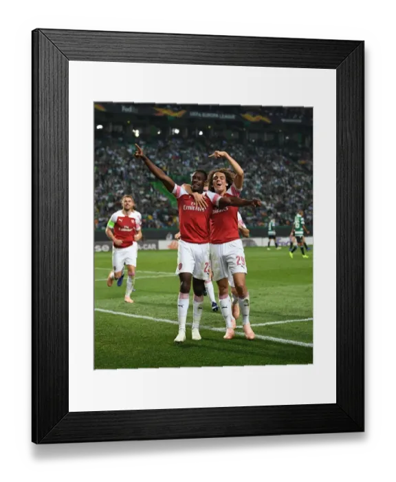 Framed Print : Arsenal's Welbeck and Guendouzi Celebrate Goal Against Sporting Lisbon in Europa League