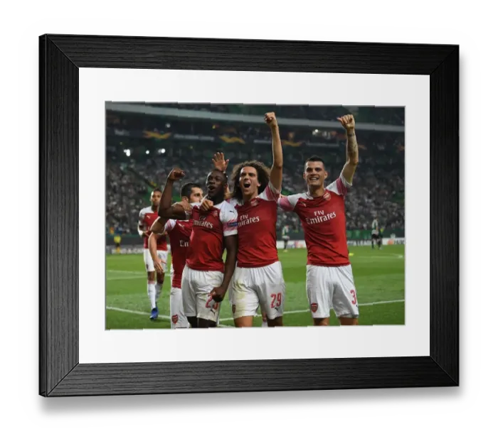 Framed Print : Arsenal Triumph: Welbeck, Guendouzi, and Xhaka Celebrate Goal in Europa League Clash vs Sporting Lisbon (2018-19) Framed Print : Arsenal Triumph: Welbeck, Guendouzi, and Xhaka Celebrate Goal in Europa League Clash vs Sporting Lisbon (2018-19)