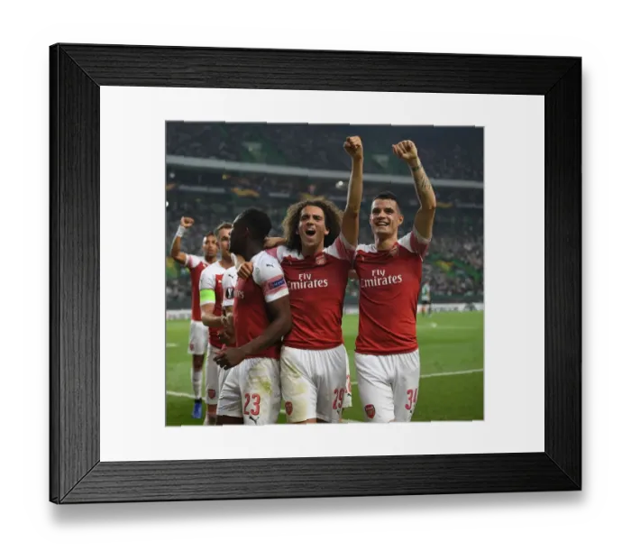 Framed Print : Celebrating a Goal: Welbeck, Guendouzi, and Xhaka (Sporting Lisbon vs Arsenal, 2018-19)