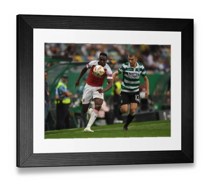Framed Print : Danny Welbeck vs. Radosav Petrovic: Clash in the Europa League between Sporting CP and Arsenal Framed Print : Danny Welbeck vs. Radosav Petrovic: Clash in the Europa League between Sporting CP and Arsenal