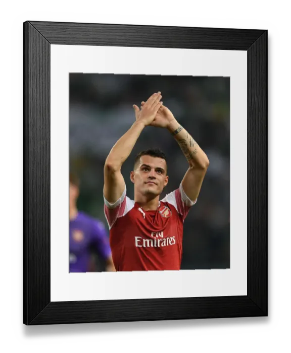 Framed Print : Granit Xhaka Celebrates with Arsenal Fans after UEFA Europa League Win over Sporting Lisbon Framed Print : Granit Xhaka Celebrates with Arsenal Fans after UEFA Europa League Win over Sporting Lisbon