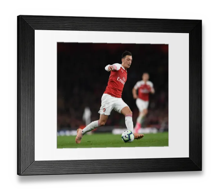Framed Print : Mesut Ozil Shines: Arsenal's 3-1 Victory Over Leicester City in the Premier League at Emirates Stadium