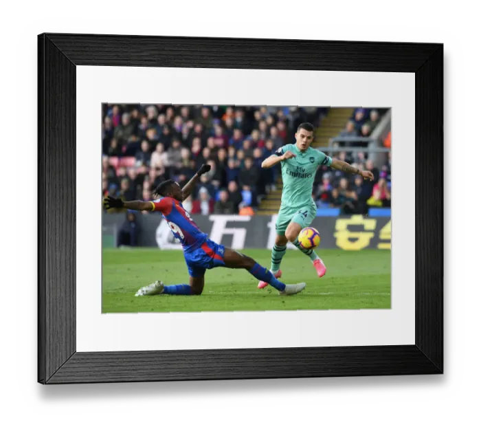 Framed Print : Xhaka vs Wan-Bissaka: A Premier League Battle at Selhurst Park