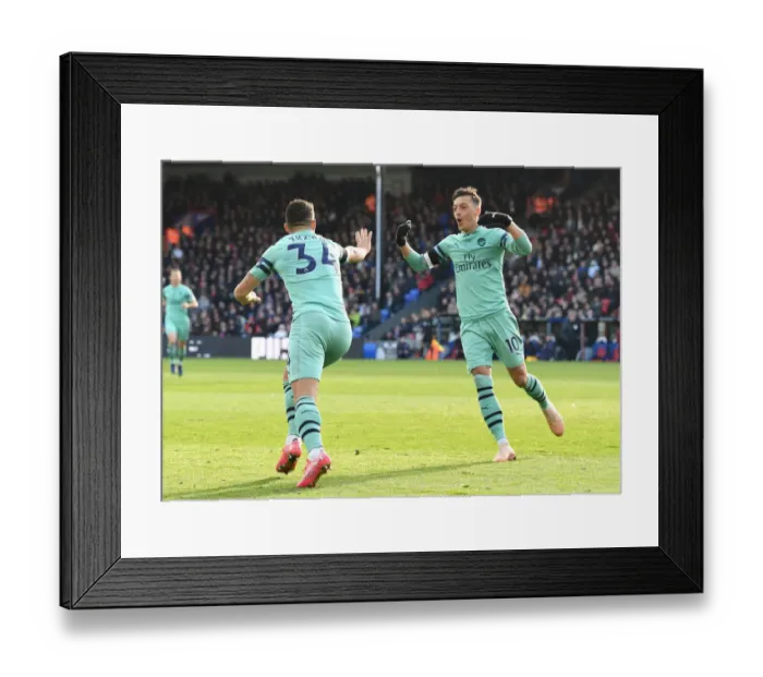 Framed Print : Xhaka and Ozil Celebrate Arsenal's First Goal Against Crystal Palace (2018-19)