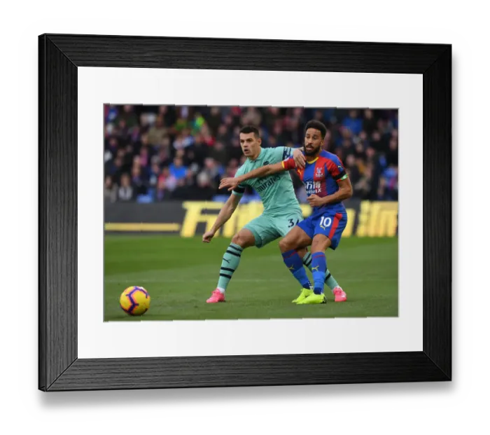 Framed Print : Xhaka vs Townsend: Intense Battle in Crystal Palace vs Arsenal Football Match Framed Print : Xhaka vs Townsend: Intense Battle in Crystal Palace vs Arsenal Football Match