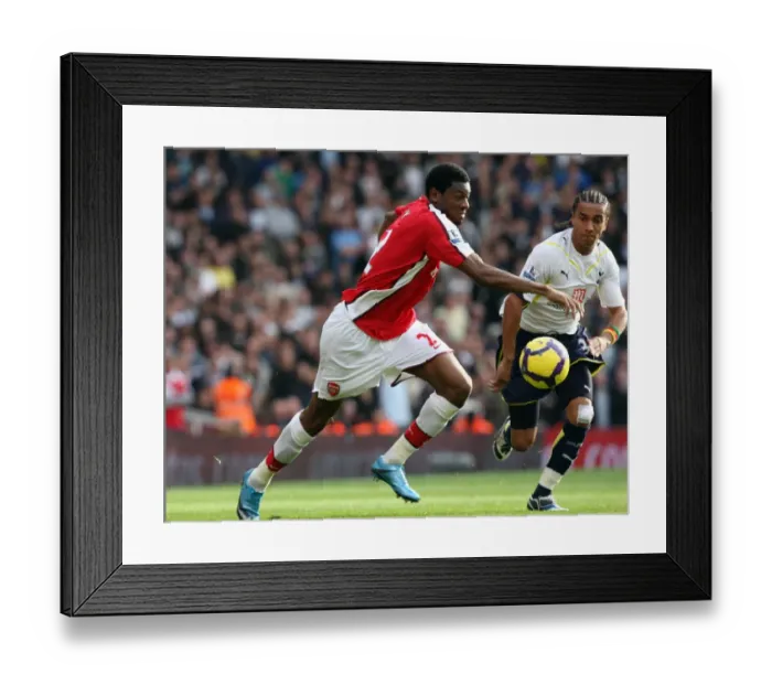 Framed Print : Arsenal's Diaby Doubles Down on Tottenham's Assou-Ekotto: 3-0 Victory in the Barclays Premier League at Emirates Stadium (October 31, 2009)