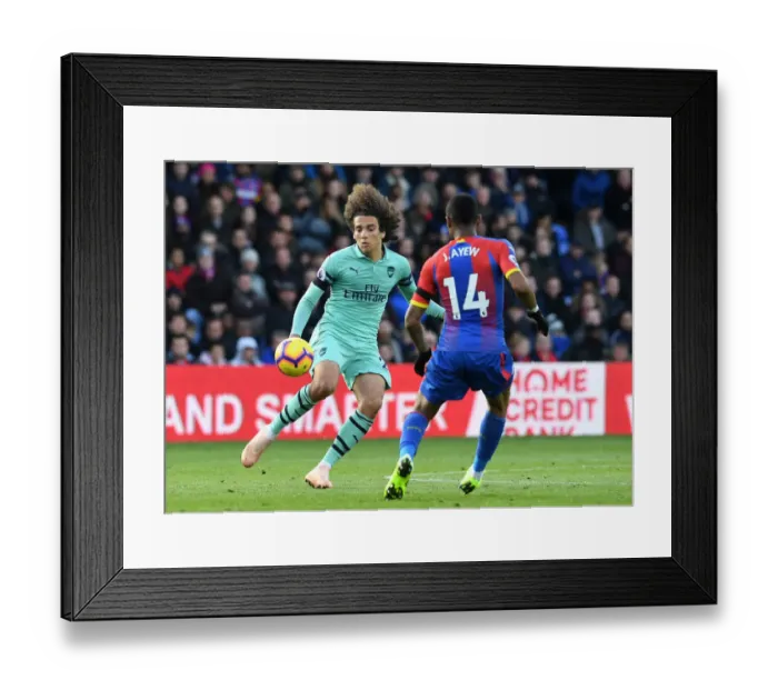 Framed Print : Guendouzi vs Ayew: Intense Battle in Crystal Palace vs Arsenal FC Premier League Clash Framed Print : Guendouzi vs Ayew: Intense Battle in Crystal Palace vs Arsenal FC Premier League Clash