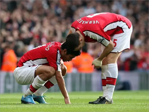 Eduardo and Thomas Vermaelen (Arsenal)