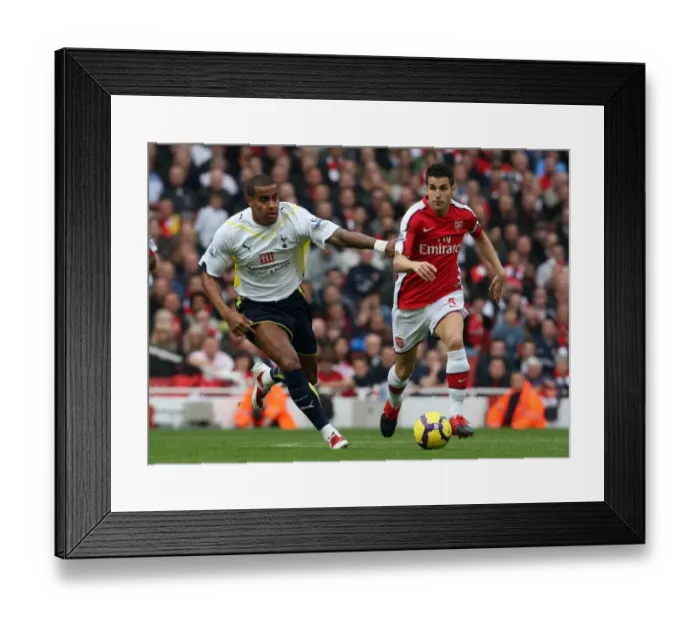 Framed Print : Clash of Stars: Fabregas Shines as Arsenal Triumphs over Tottenham 3-0 in Premier League Framed Print : Clash of Stars: Fabregas Shines as Arsenal Triumphs over Tottenham 3-0 in Premier League