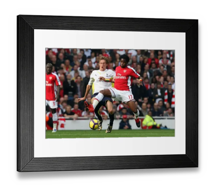 Framed Print : Arsenal's Victory: Alex Song vs. Peter Crouch in the Intense Arsenal 3:0 Tottenham Hotspur Barclays Premier League Clash at Emirates Stadium (October 31, 2009)