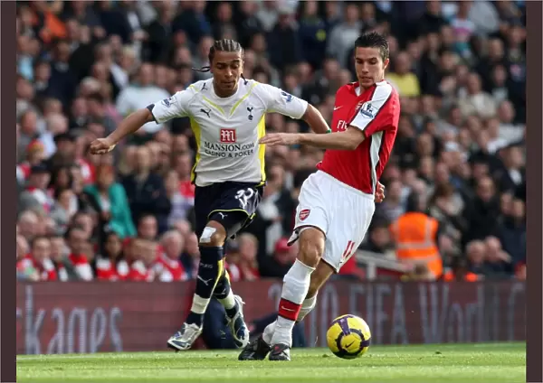 Robin van Persie (Arsenal) Benoit Assou-Ekotto (Tottenham)