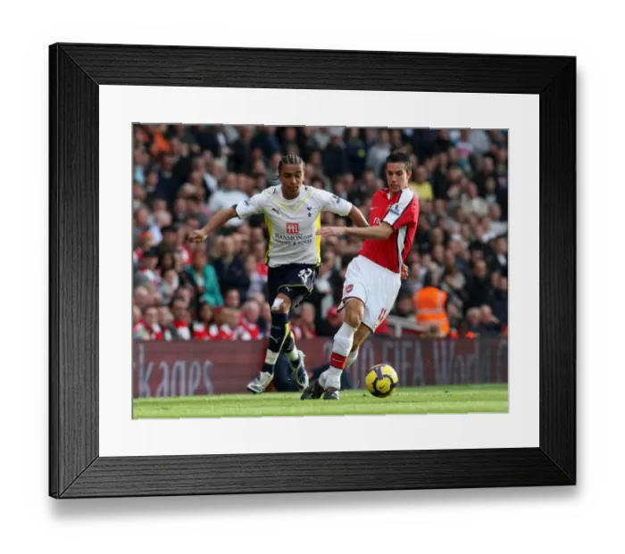 Framed Print : Robin van Persie (Arsenal) Benoit Assou-Ekotto (Tottenham) Framed Print : Robin van Persie (Arsenal) Benoit Assou-Ekotto (Tottenham)