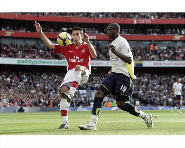 Robin van Persie (Arsenal) Sebastien Bassong (Tottenham)