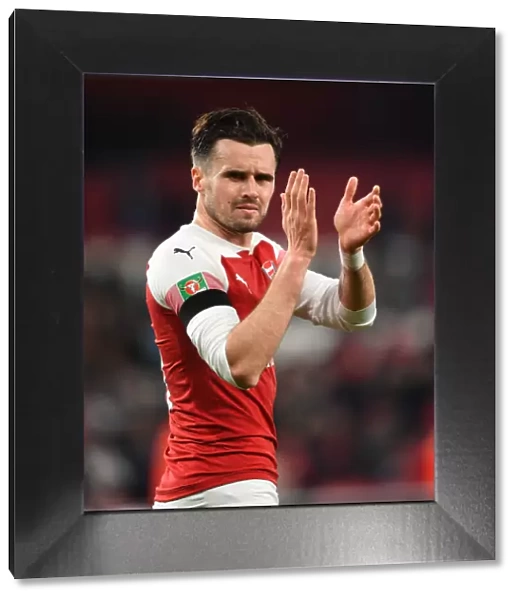 Carl Jenkinson Celebrates Carabao Cup Victory with Arsenal Fans