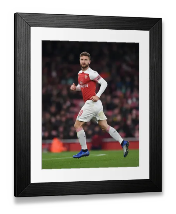 Framed Print : Arsenal's Unyielding Defender: Shkodran Mustafi in Carabao Cup Clash Against Blackpool Framed Print : Arsenal's Unyielding Defender: Shkodran Mustafi in Carabao Cup Clash Against Blackpool