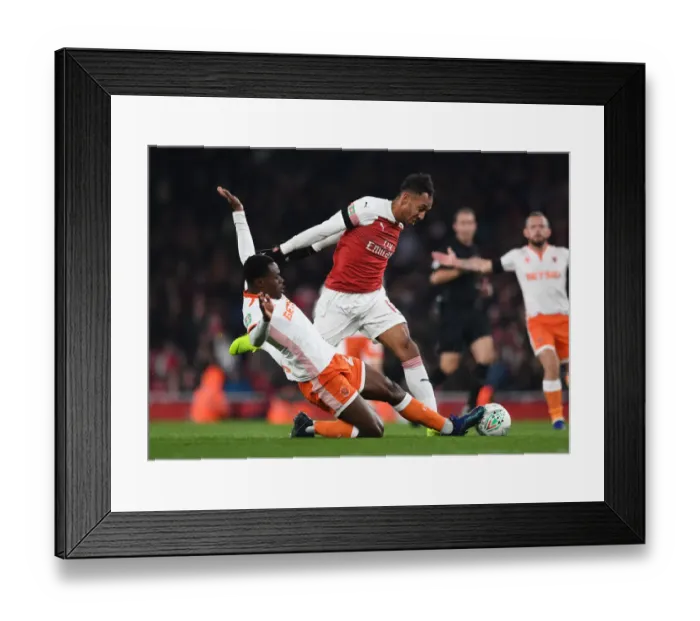 Framed Print : Aubameyang vs Bola: A Fierce Face-off in Arsenal's Carabao Cup Showdown Framed Print : Aubameyang vs Bola: A Fierce Face-off in Arsenal's Carabao Cup Showdown