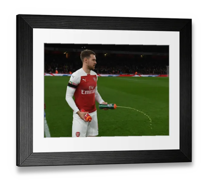 Framed Print : Aaron Ramsey: Arsenal's Focus before Carabao Cup Clash vs Blackpool Framed Print : Aaron Ramsey: Arsenal's Focus before Carabao Cup Clash vs Blackpool
