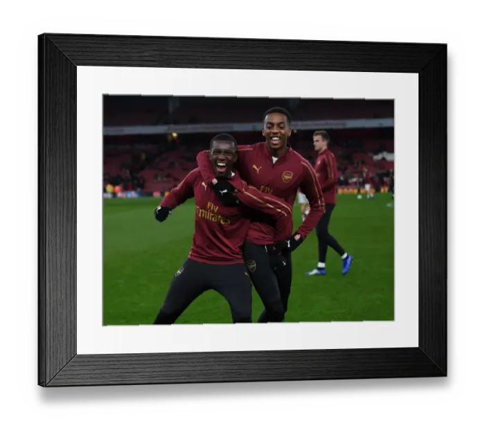 Framed Print : Arsenal's Nketiah and Willock Prepared for Carabao Cup Showdown Against Blackpool Framed Print : Arsenal's Nketiah and Willock Prepared for Carabao Cup Showdown Against Blackpool