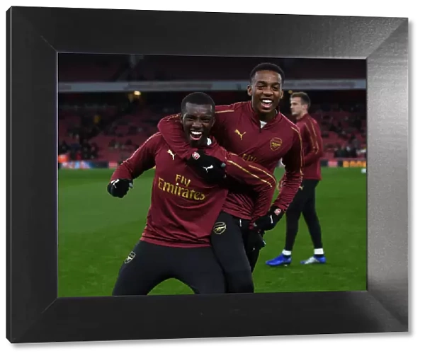 Arsenal's Nketiah and Willock Prepare for Carabao Cup Clash Against Blackpool