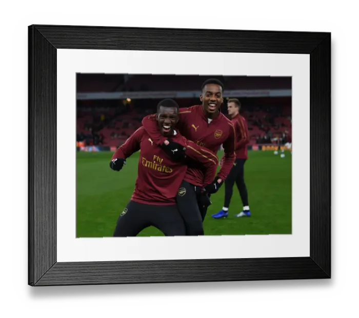 Framed Print : Arsenal's Nketiah and Willock Prepare for Carabao Cup Clash Against Blackpool Framed Print : Arsenal's Nketiah and Willock Prepare for Carabao Cup Clash Against Blackpool