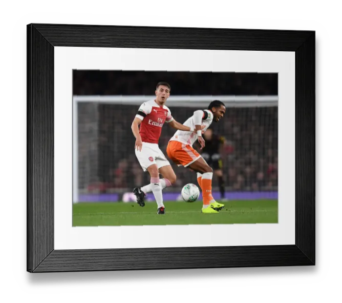 Framed Print : Intense Face-off: Pleguezuelo vs. Delfouneso in Arsenal's Carabao Cup Showdown