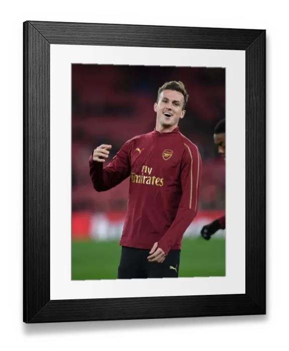 Framed Print : Rob Holding: Arsenal's Steadfast Defender in Carabao Cup Battle against Blackpool Framed Print : Rob Holding: Arsenal's Steadfast Defender in Carabao Cup Battle against Blackpool