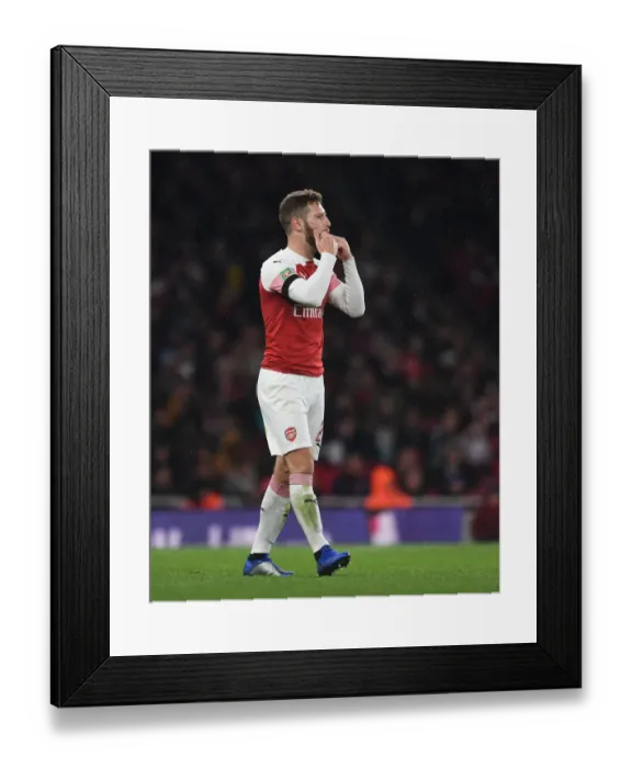 Framed Print : Shkodran Mustafi Focuses in Arsenal's Carabao Cup Clash Against Blackpool
